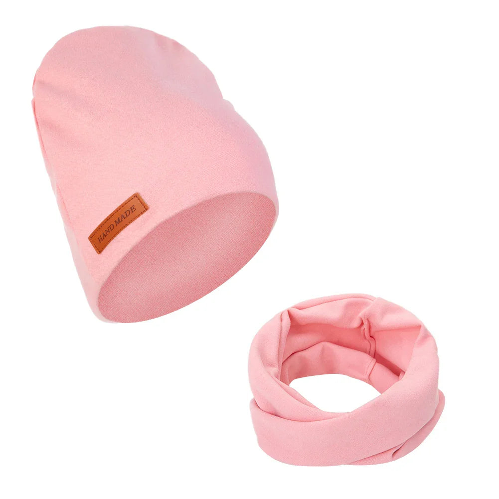 Baby winter hat and scarf set laid flat, showcasing the full design, unisex newborn clothes