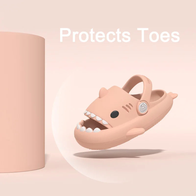 Playful shark cartoon sandals for kids, anti-slip, perfect for beach or home.