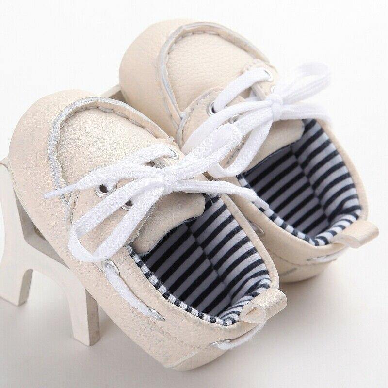 Cute black baby leather loafer boots, ideal for new walkers, comfortable infant footwear with anti-slip design