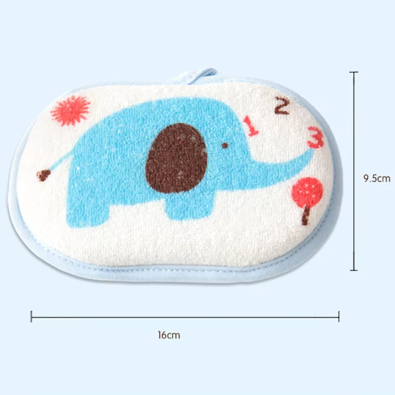 Green elephant bath sponge, a playful and gentle tool for baby bath hygiene.