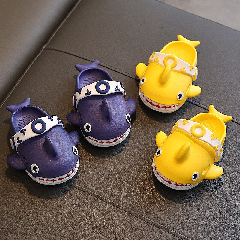 Yellow and green cartoon shark slippers for children, a perfect blend of style and function.