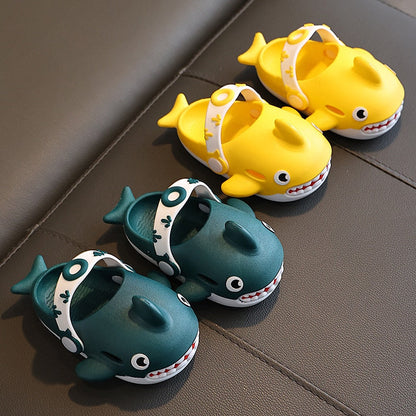 Blue children's footwear shaped like a shark, promoting fun and safety for little feet.