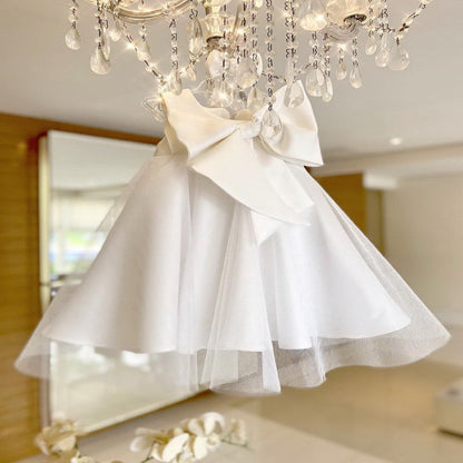 Versatile girls' sleeveless princess dress with a big bow, suitable for various special occasions.