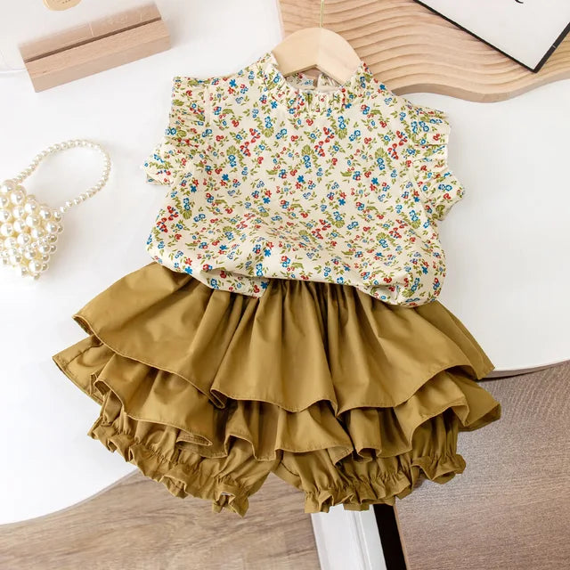 Adorable girls' floral print summer top and skirt set in soft cotton for toddlers, perfect playwear.