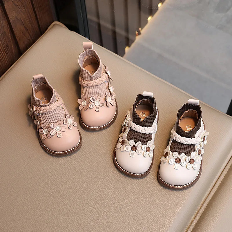 Sweet pink floral pattern soft sole toddler shoes for baby girls.