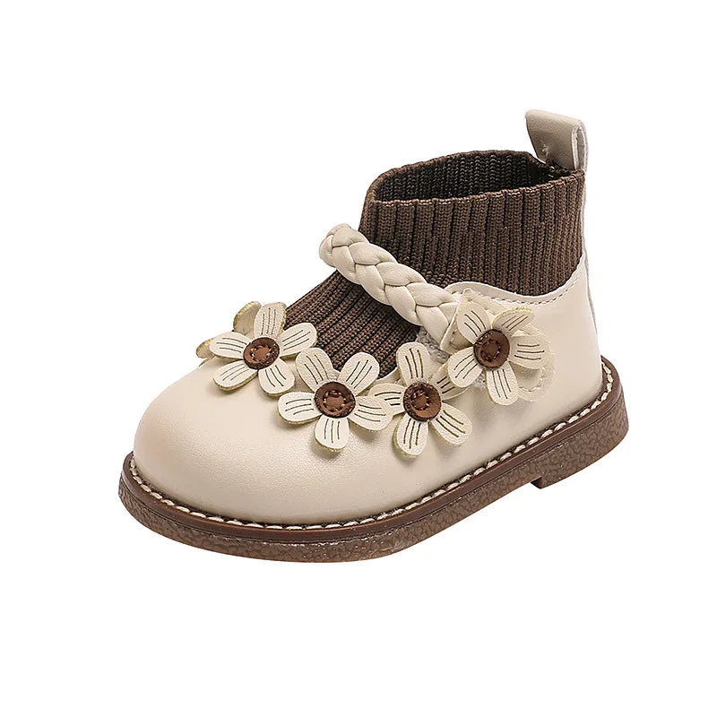 Comfortable and stylish floral soft sole baby girls' shoes for everyday wear.