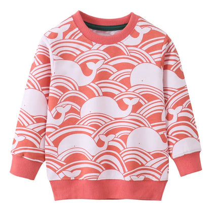 Toddler girl in a soft cotton long sleeve dress featuring an all-over whale pattern, front view