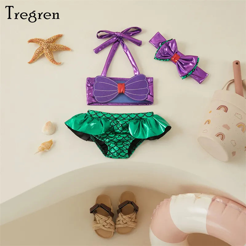 Cute two-piece mermaid bikini for baby girls, featuring scale detail and a pretty bow headband, polyester