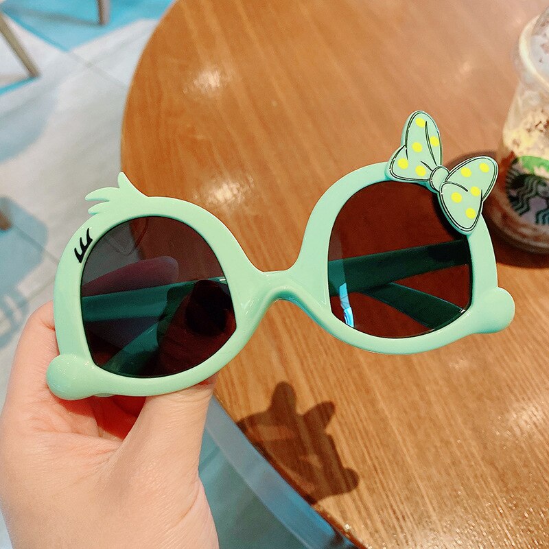Girls' fashion sunglasses with an adorable rabbit cartoon, perfect for sun-safe outdoor play.