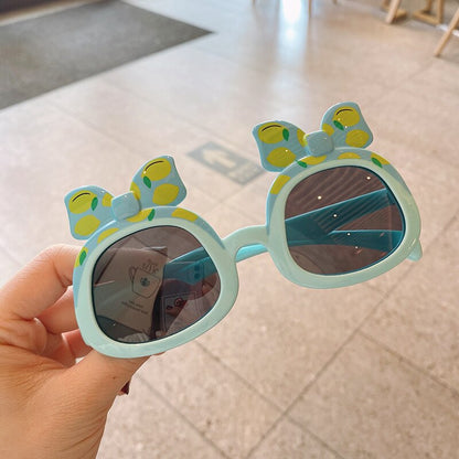 Bright yellow duck cartoon sunglasses for toddlers, an excellent kids gift with UV protection.
