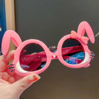 Purple cat cartoon sunglasses for girls, a stylish and protective eyewear choice for children.