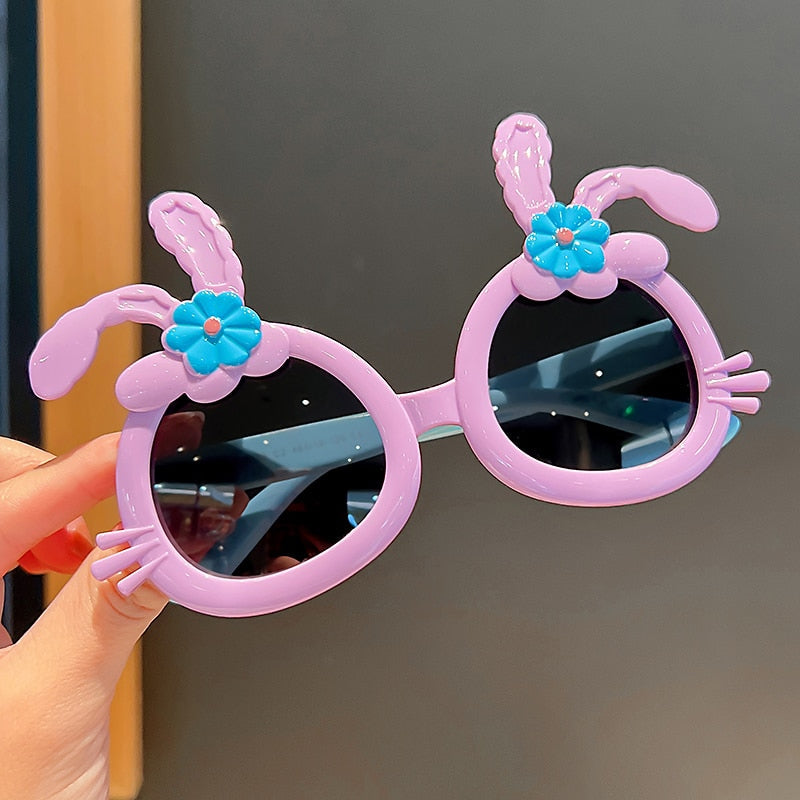 Outdoor girls' sunglasses featuring a cute pink rabbit and essential UV protection.