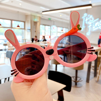 Adorable yellow duck cartoon sunglasses for kids, ensuring UV safety for their adventures.