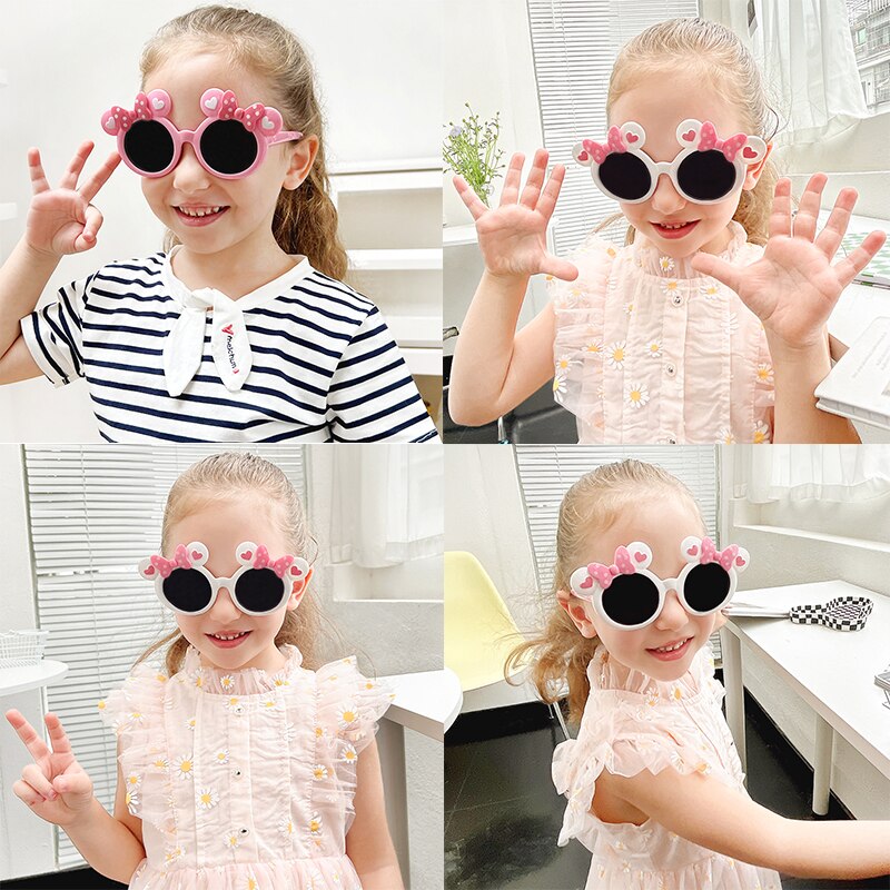 Charming girls' bee cartoon sunglasses, ideal for outdoor activities with UV protection.