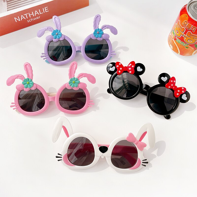 Girls' yellow duck cartoon sunglasses, perfect for toddlers needing UV protection outdoors.