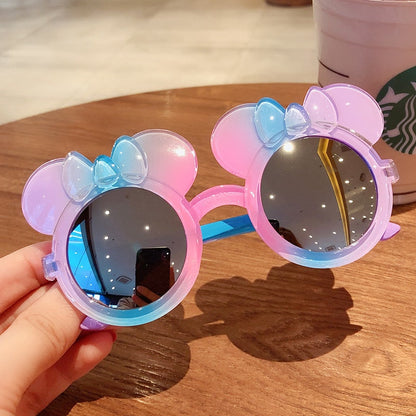 Chic girls' cat-eye cartoon sunglasses in purple, ensuring UV protection for stylish toddlers.