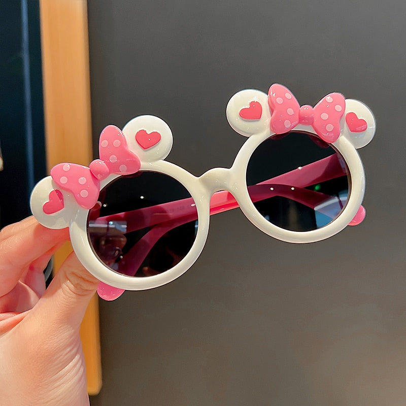 Sweet girls' bee cartoon sunglasses with durable UV protection lenses for active kids.