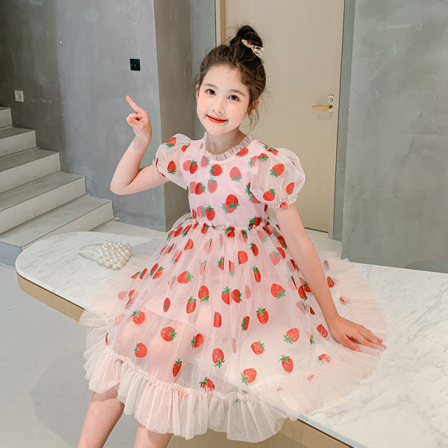 Cute pink strawberry puff sleeve dress for young girls, featuring a charming ruffle detail
