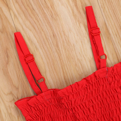 Close-up of a girls' rainbow strap summer dress, showcasing colorful stripes and soft cotton blend fabric