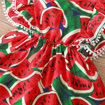 Cute kids' cotton dress with vibrant watermelon print, paired with a matching headband for summer fashion.