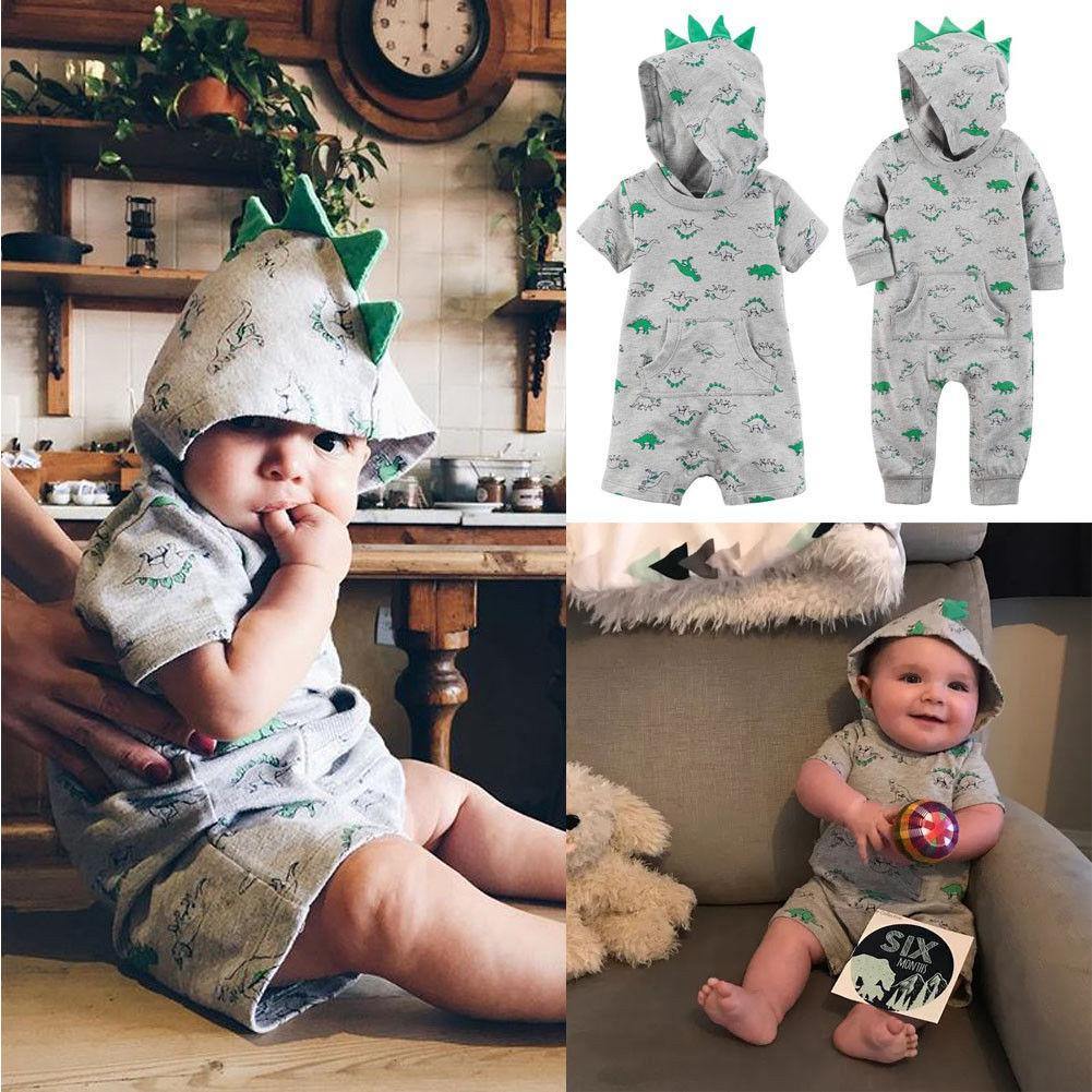 Cute long sleeve baby dinosaur jumpsuit with hood, comfortable cotton for toddlers.