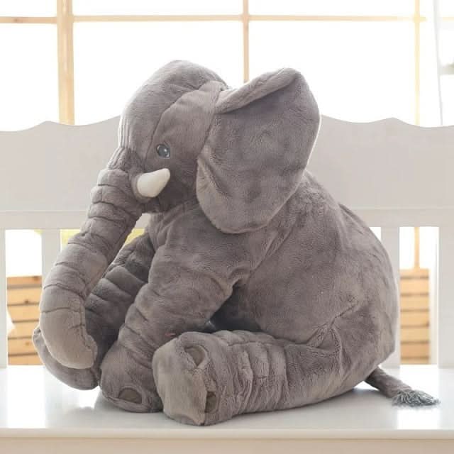 Plush elephant cuddle pillow, a versatile soft toy for baby comfort, toddler play, and cute nursery decor.