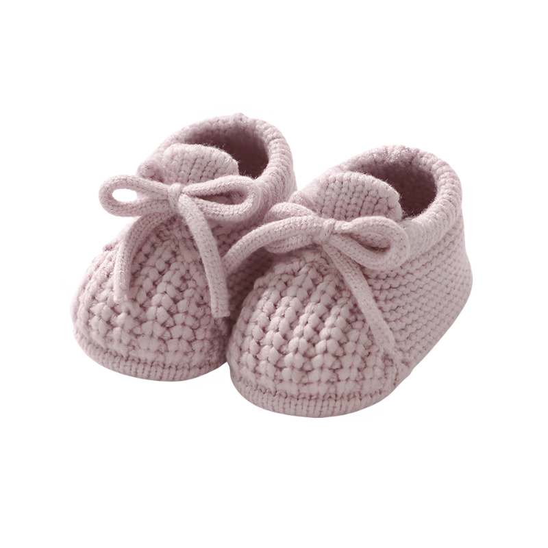 Hand-knitted baby booties in a multi-colored yarn, soft and warm infant footwear.