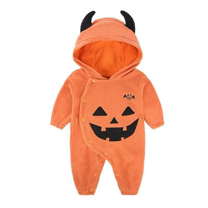 Toddler modeling a cozy pumpkin baby costume onesie, great for Halloween celebrations.