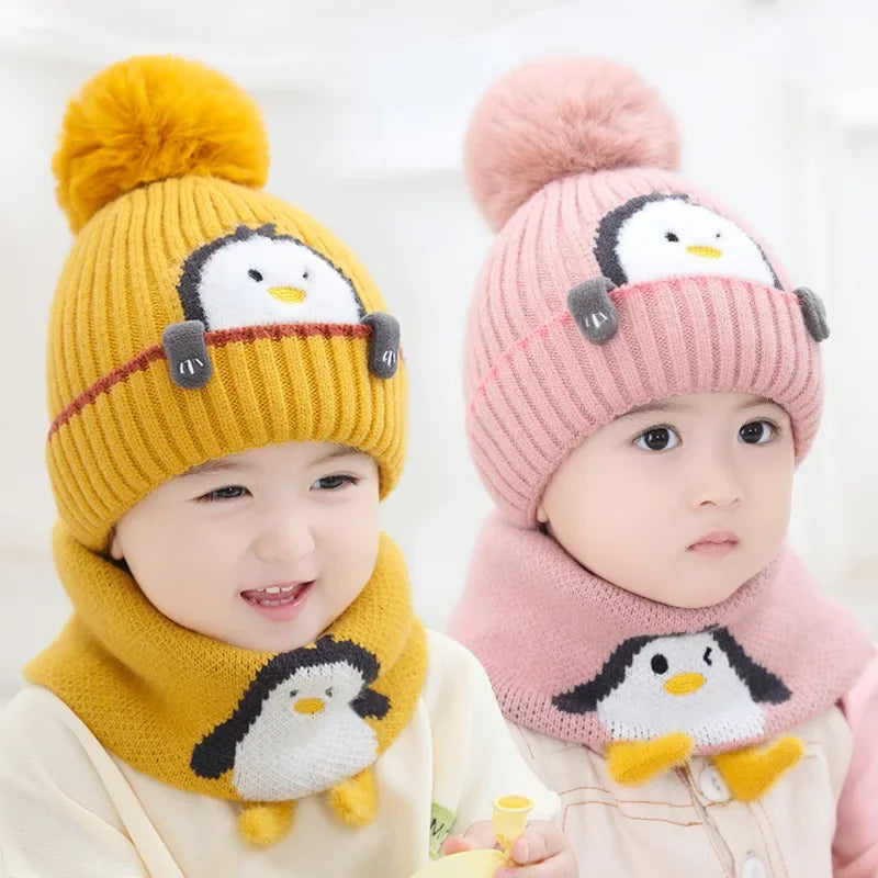 Toddler's cozy winter hat and scarf set featuring a cute penguin design, perfect for cold weather