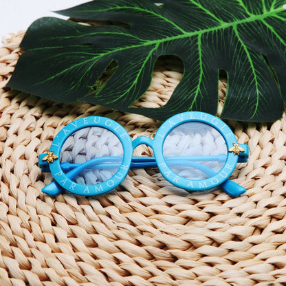 Infant's round frame UV protection sunglasses, lightweight and comfortable for sensitive eyes.