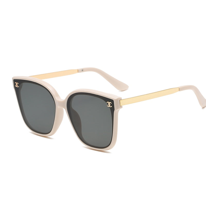 Sweet children's green round frame eyewear, designed for UV protection during outdoor play.