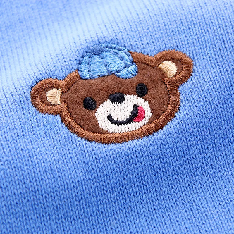 Unisex knitted cardigan with bear print for kids, warm and stylish fall outerwear accessory.