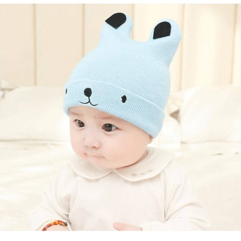 Cute cotton knitted bear hat, ideal baby accessory for toddlers and young children.