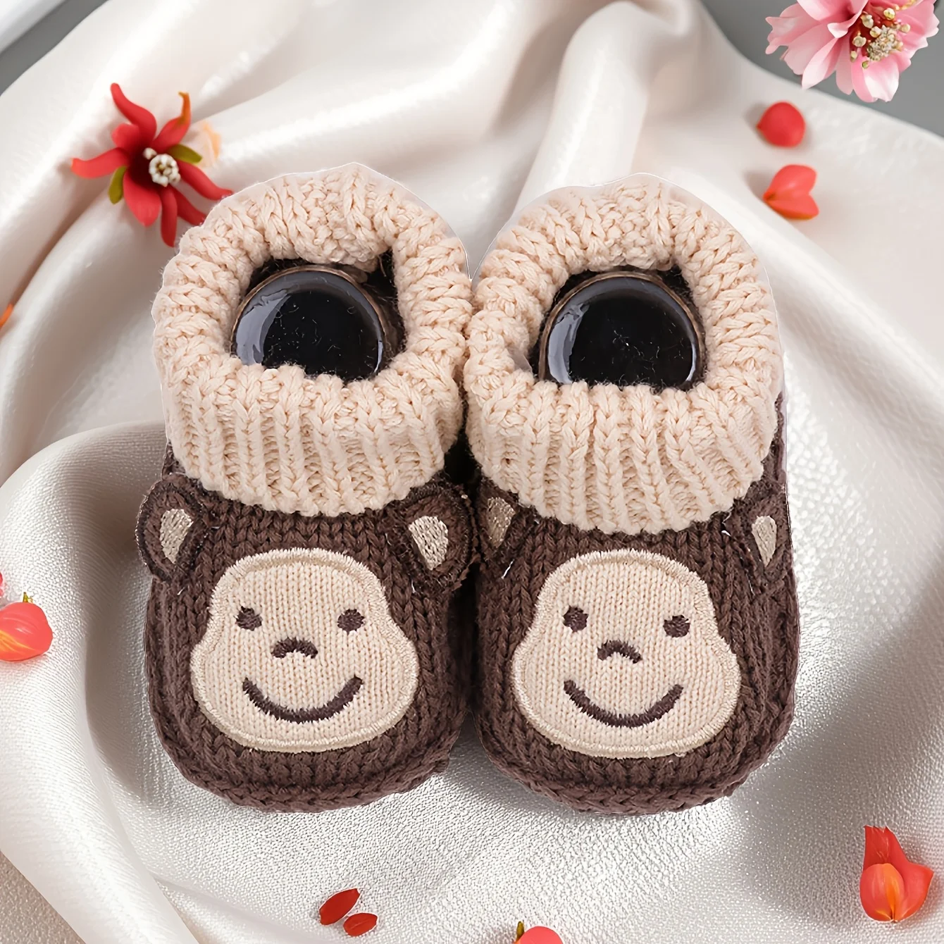 Cute animal print non-slip baby booties, a stylish and practical choice for infants.
