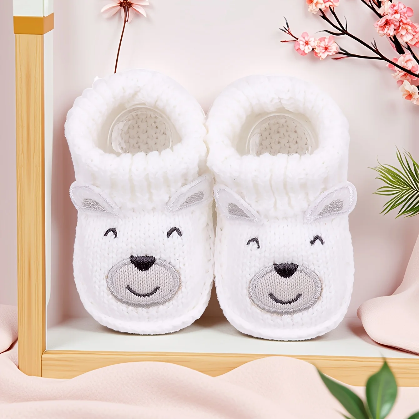 High-quality knitted baby footwear, soft and non-slip for growing babies.