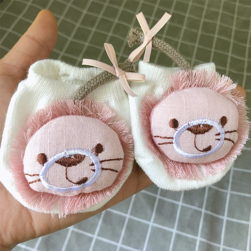 Cozy baby socks with an anti-slip sole, designed for newborns, showcasing a sweet elephant