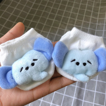 Infant anti-slip socks with a cheerful monkey design, soft cotton footwear for newborn babies