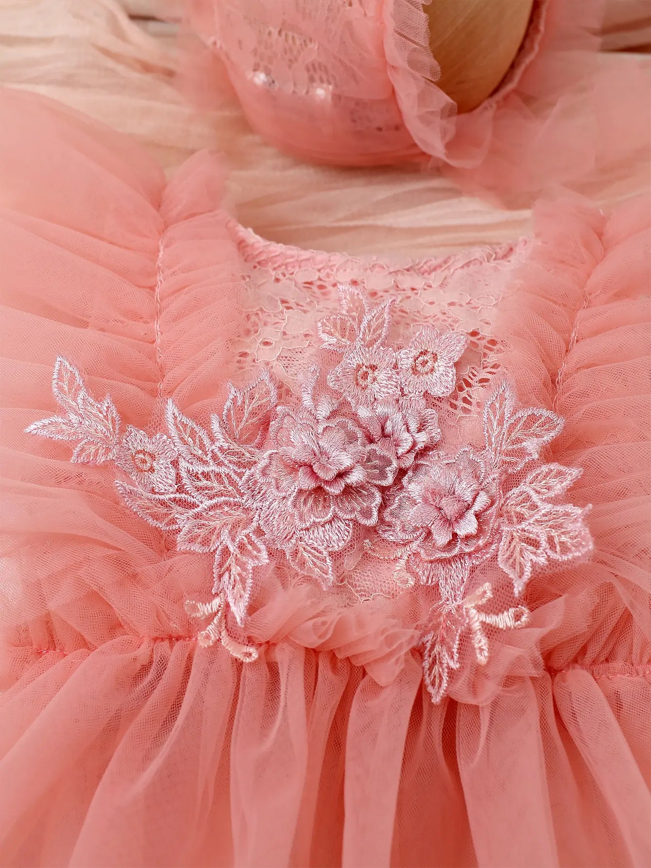 Soft polyester baby girl romper set featuring a beautiful floral lace and mesh design.