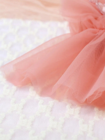 Front view of a cute and comfortable baby girl's pink lace floral mesh romper, newborn size.