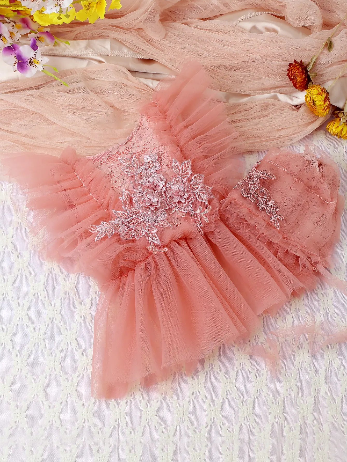 Pink baby girl romper set with elegant lace and breathable mesh, perfect for infant fashion.