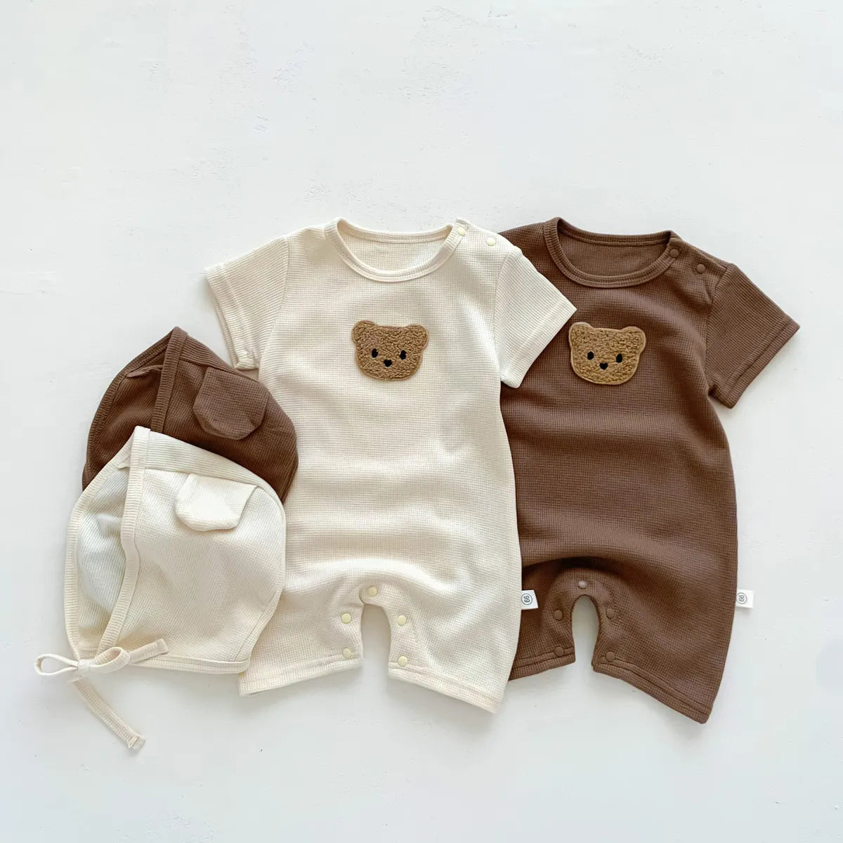 Adorable newborn bear themed cotton romper set for infants, unisex baby clothing.