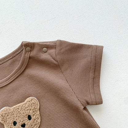 Child-safe cotton newborn bear romper, ensuring comfort for delicate baby skin.