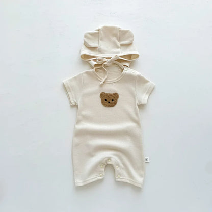 Newborn baby wearing a cozy bear romper, perfect for an infant gift, short sleeve.