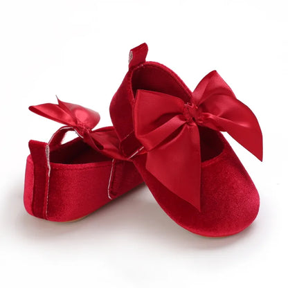 Group of various colored baby girl bow flat shoes, anti-slip soft sole for first steps