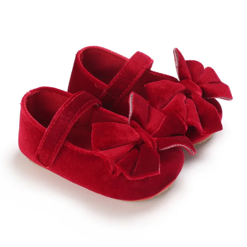 Pair of red baby girl flat shoes with bows, anti-slip cotton for first walkers, baby fashion