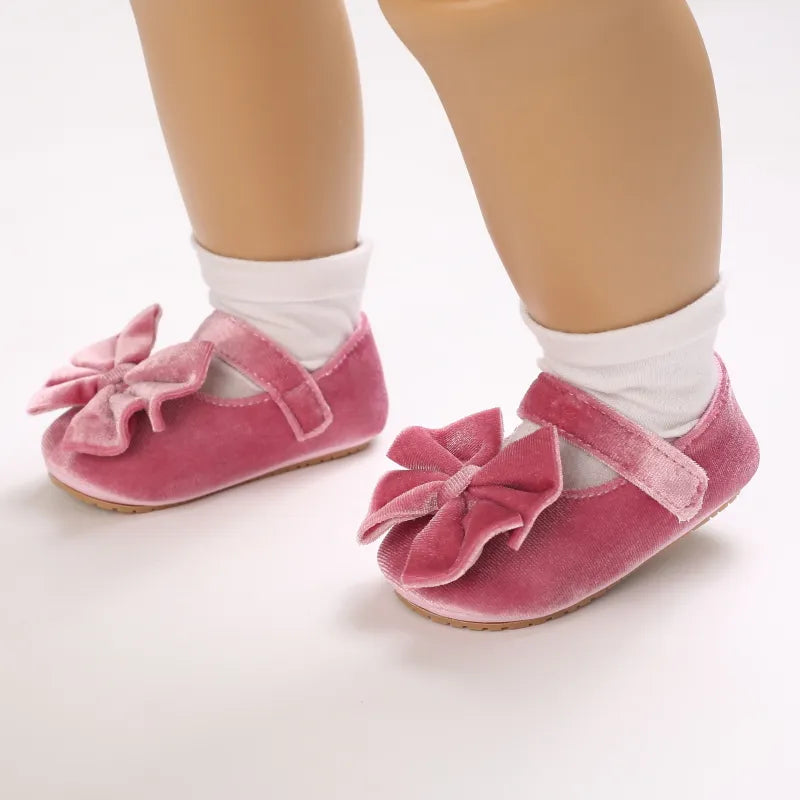 Yellow baby girl first walker flat shoes featuring a sweet bow, soft anti-slip sole, infant footwear