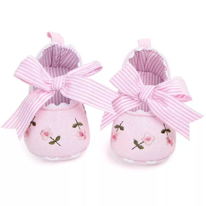 Elegant pink lace floral first walker shoes for a baby girl, perfect for special occasions or daily wear.