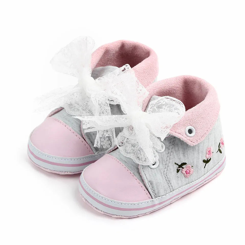 Navy blue lace floral first walker shoes, designed for baby girls taking their first steps, comfortable cotton.