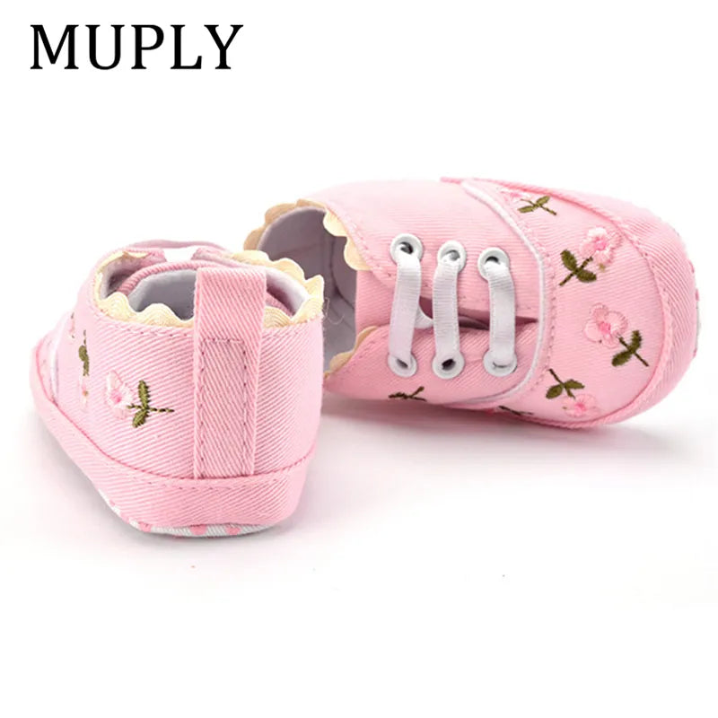 Soft cotton white baby girl's first walker shoes with beautiful lace floral embellishments, crib shoes.