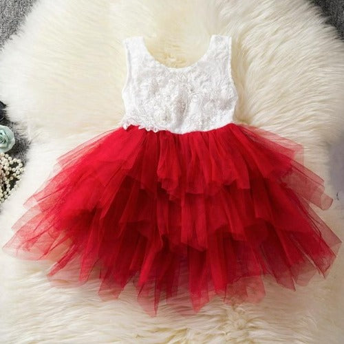 Close-up of a charming girls' backless princess tutu dress with delicate ruffles and bow detail.